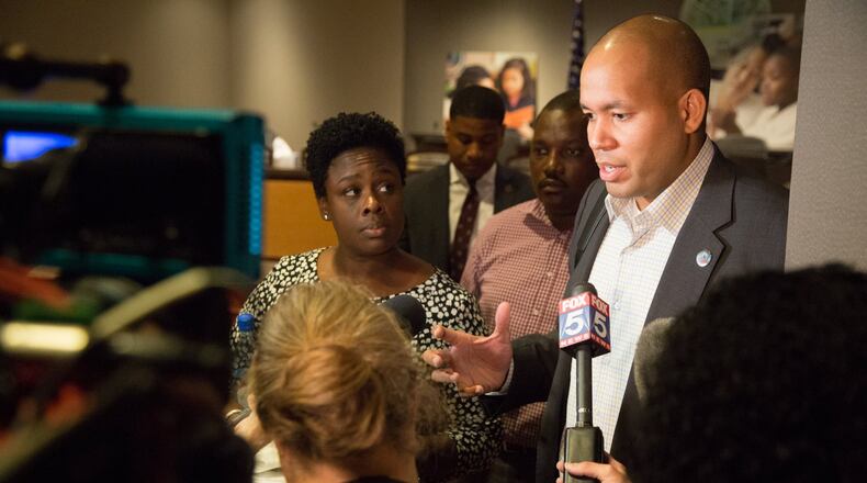 Atlanta School Board Vice Chair Eshe’ Collins (left) and Chair Jason Esteves talk to the media after they announced that they would not extend Superintendent Meria Carstarphen’s contact on Monday, September 9. (Photo by Phil Skinner).