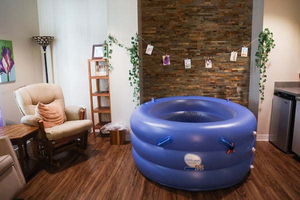 An inflatable pool sits in the center of the birthing room at the Atlanta Birth Center in Atlanta on Thursday, April 23, 2026. (Abbey Cutrer/AJC)