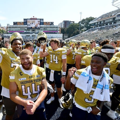 Georgia Tech players celebrate after Georgia Tech defeated Mercer during the second half of an NCAA college football game at Bobby Dodd Stadium on Saturday, Sept. 19, 2026, in Atlanta. Georgia Tech defeated Mercer 44-11. (Hyosub Shin/AJC)