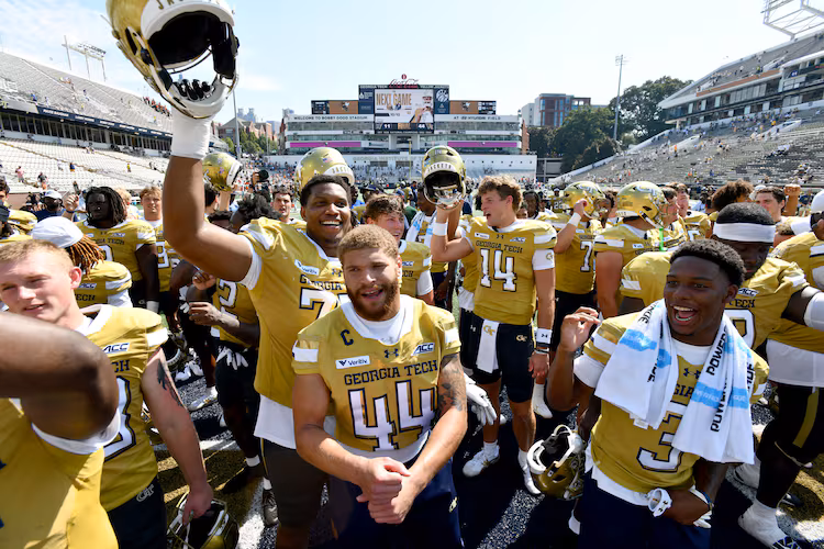 Georgia Tech players celebrate after Georgia Tech defeated Mercer during the second half of an NCAA college football game at Bobby Dodd Stadium on Saturday, Sept. 19, 2026, in Atlanta. Georgia Tech defeated Mercer 44-11. (Hyosub Shin/AJC)