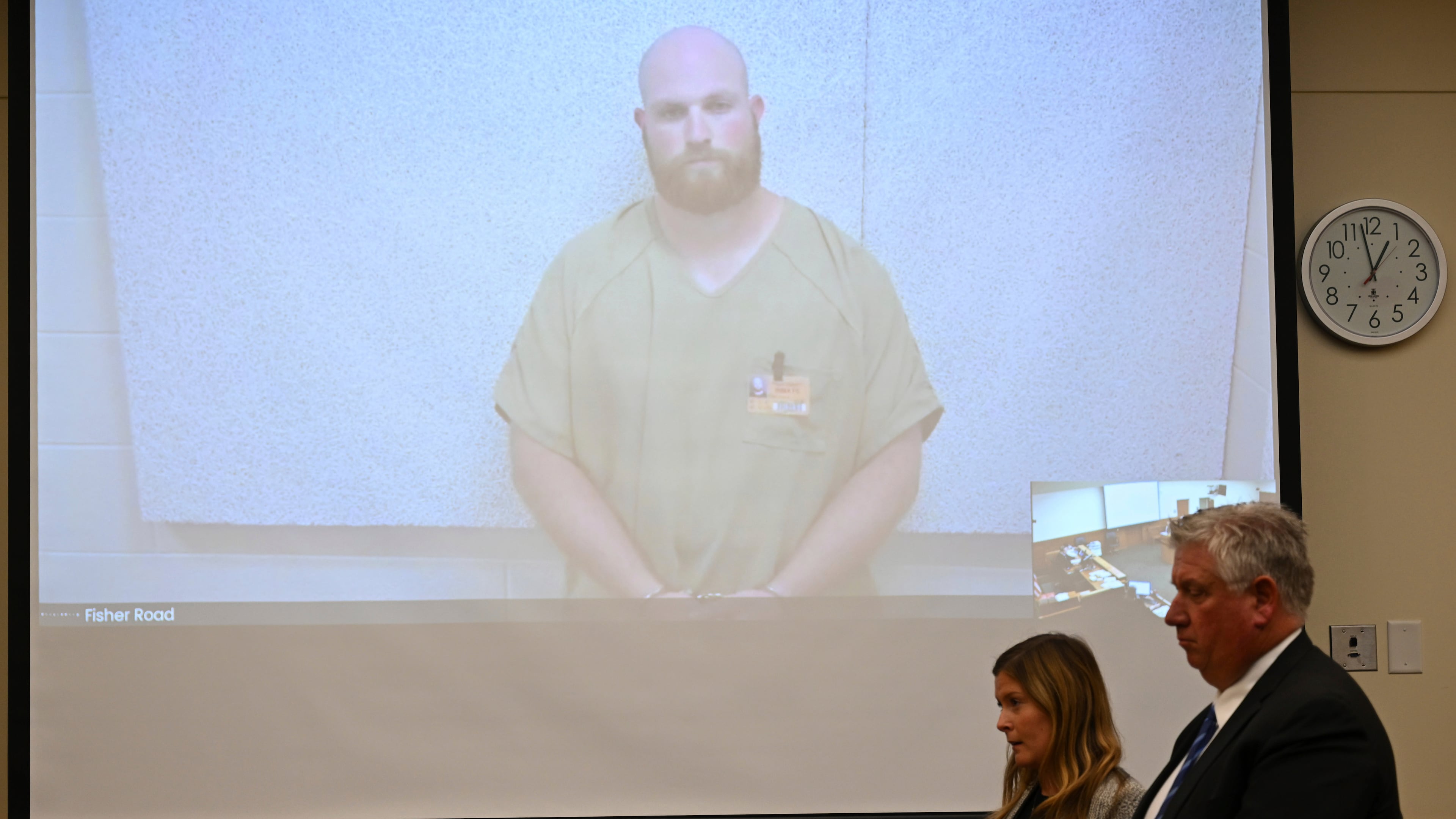 FILE - Blendon Township police officer Connor Grubb listens while appearing via video from jail for his arraignment hearing, Aug. 14, 2024, at the Franklin County Court of Common Pleas in Columbus. (AP Photo/David Dermer, File)