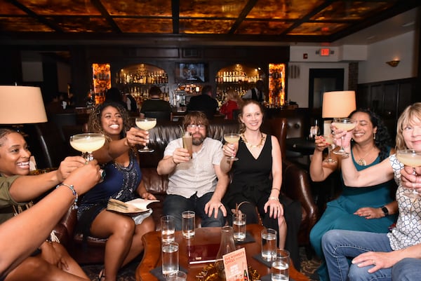 On Unexpected Atlanta's Prohibition Progressive Dinner, attendees take a tour of Downtown Atlanta and learn details about the Prohibition era while sampling food and drink at restaurants. (Courtesy of Unexpected Atlanta)