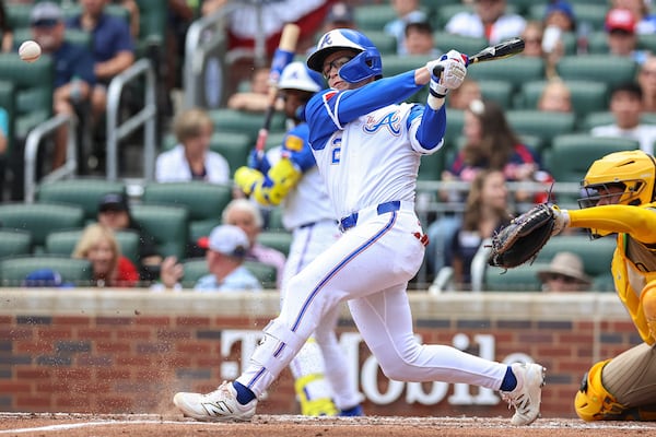 Atlanta Braves' Nick Allen (2) drives in a run with an infield single in the second inning of a baseball game against the San Diego Padres, Saturday, May 24, 2025, in Atlanta. (AP Photo/Colin Hubbard)