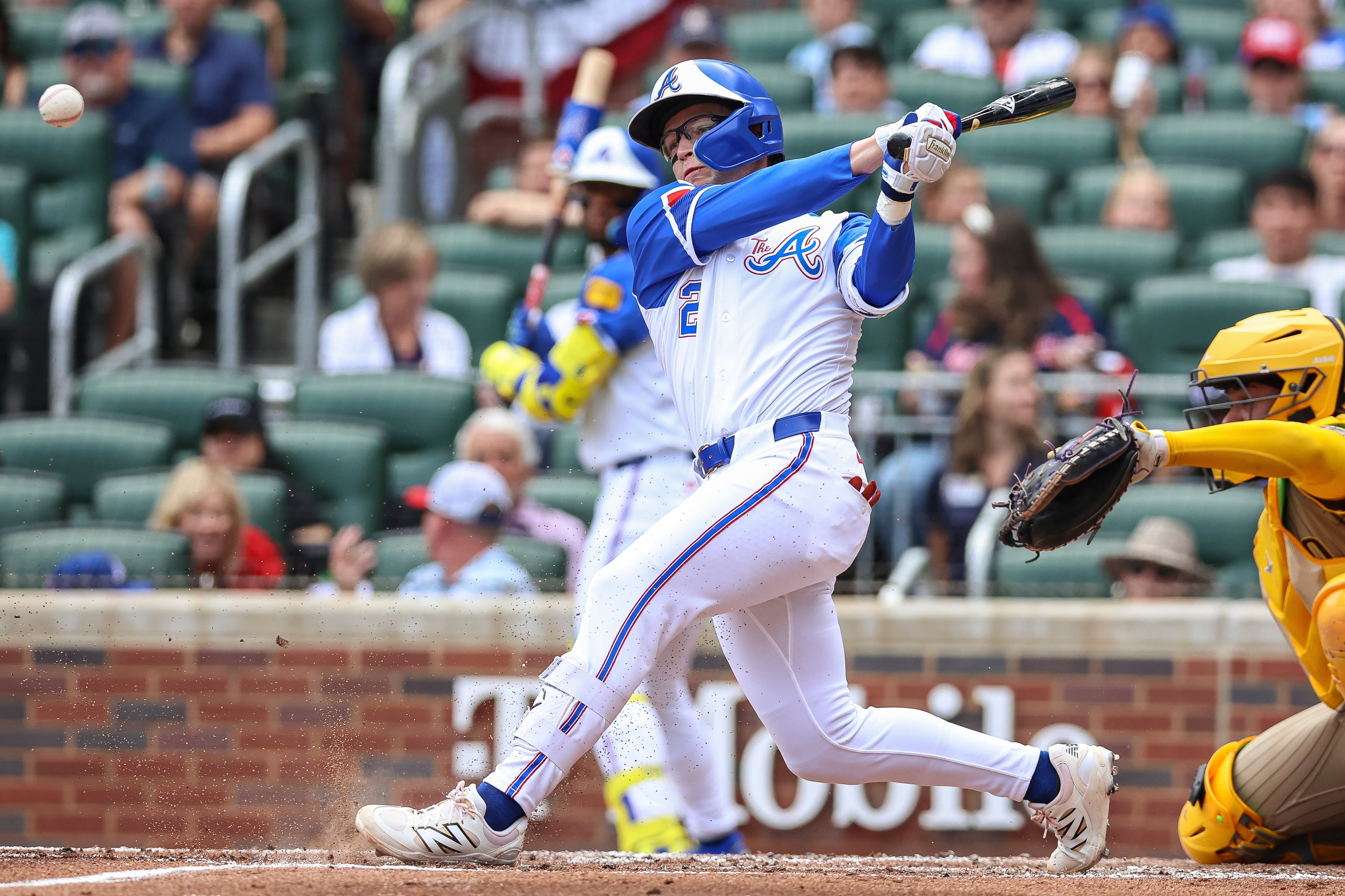 Atlanta Braves' Nick Allen (2) drives in a run with an infield single in the second inning of a baseball game against the San Diego Padres, Saturday, May 24, 2025, in Atlanta. (AP Photo/Colin Hubbard)