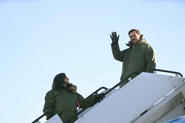 Vice President JD Vance, right, and second lady Usha Vance arrive at Pituffik Space Base in Greenland, Friday, March 28, 2025. (Jim Watson/Pool via AP)