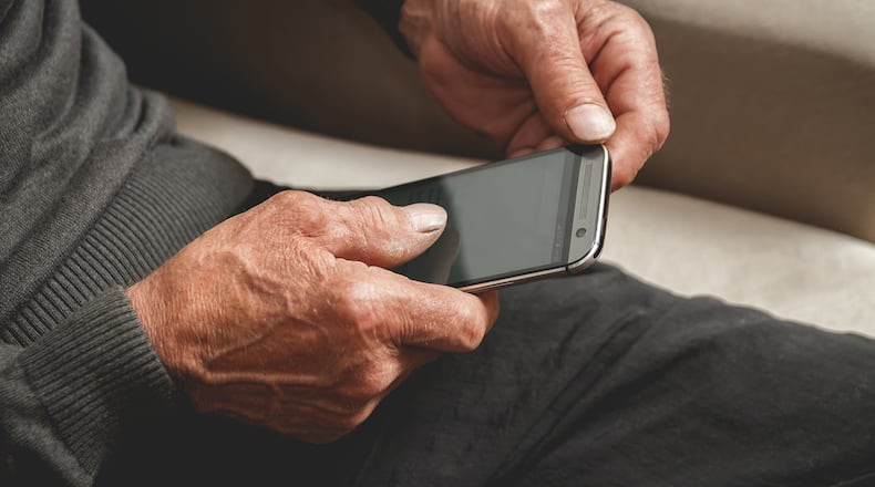 Older adults can make connections with a Friendship Buddy from Happy Talks who will call them on the phone. (Dreamstime/TNS)