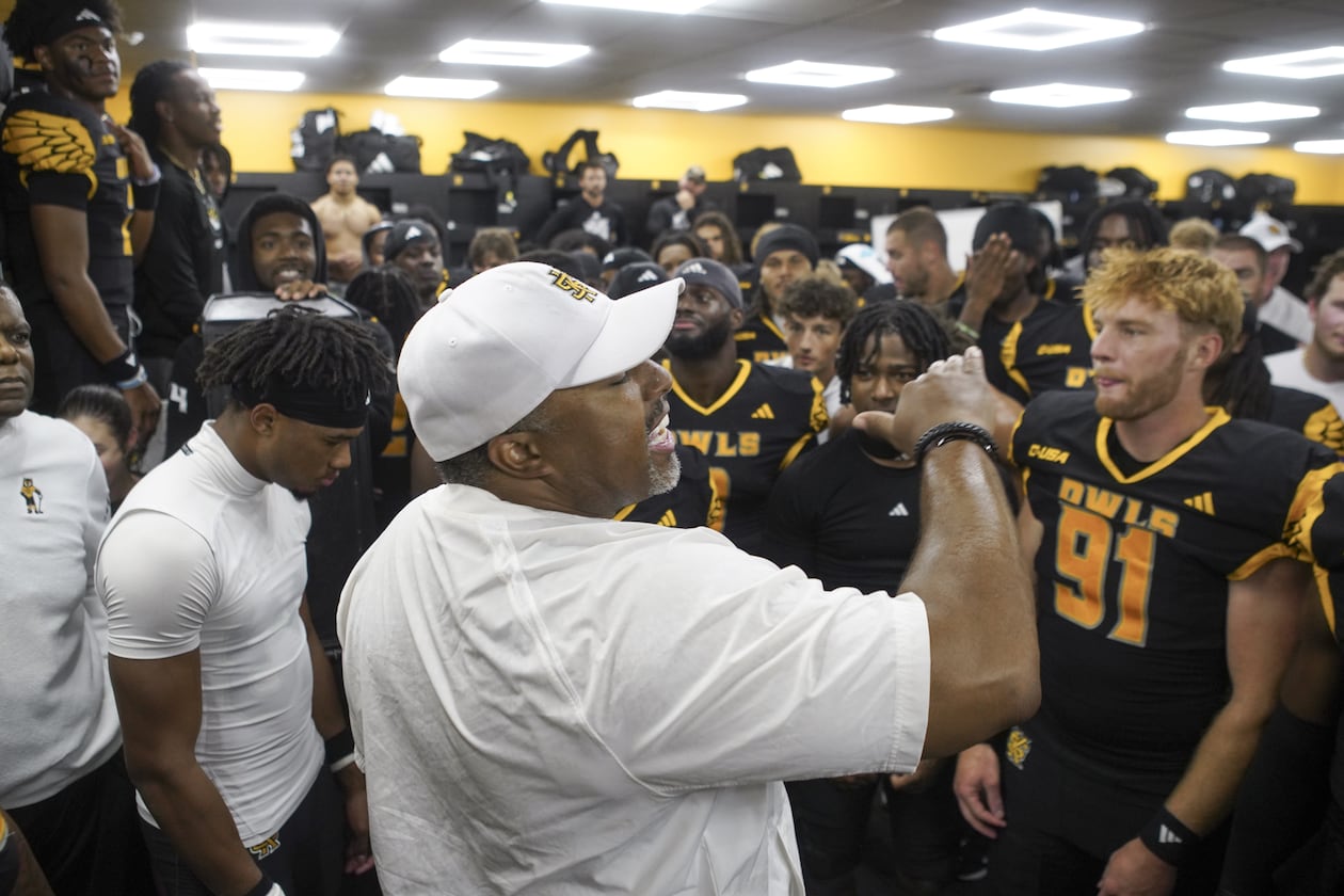 Kennesaw State coach Jerry Mack celebrates with his players in the locker room after the 35-7 win over Louisiana Tech, Oct. 9, 2025. (Kennesaw State Athletics)