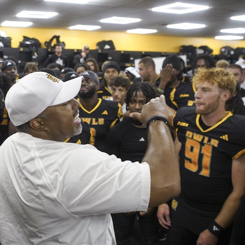 Kennesaw State coach Jerry Mack celebrates with his players in the locker room after the 35-7 win over Louisiana Tech, Oct. 9, 2025. (Kennesaw State Athletics)