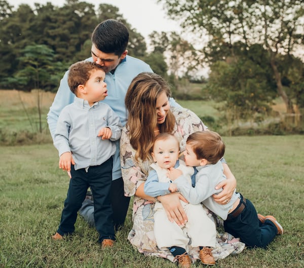 The author, Keri Janton, with her husband Dan and sons Max (from left), Beau and Duke. Courtesy of  Michele Zakeri
