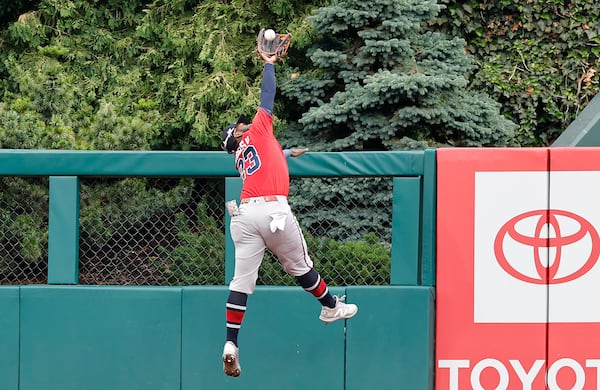 Braves center fielder Michael Harris II robs the Phillies' Max Kepler of a home run during Game 1 of Thursday's doubleheader.