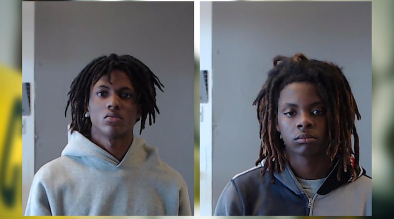 Jaushawn Davis (left) and Christian Boyd were arrested Wednesday and charged with murder in an Oct. 14 shooting, police said.