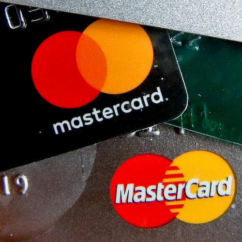 FILE - In this Feb. 20, 2019, file photo are Mastercard and Visa credit cards in Zelienople, Pa. (AP Photo/Keith Srakocic, File)