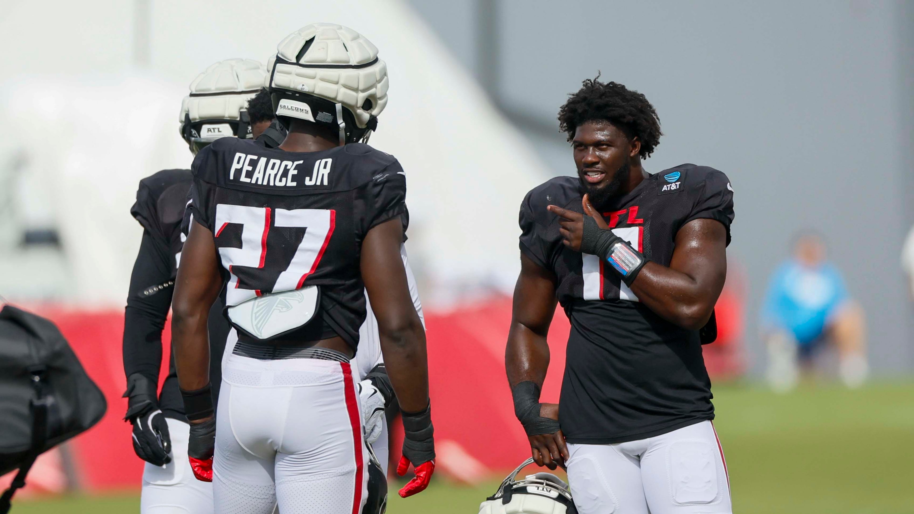 The Falcons are banking on Jalon Walker (right) and James Pearce Jr. putting a good bit of quarterbacks in the dirt. Walker, from Georgia, and Pearce, from Tennessee, are as battle tested as it gets coming from top tier SEC programs. (Miguel Martinez/AJC)
