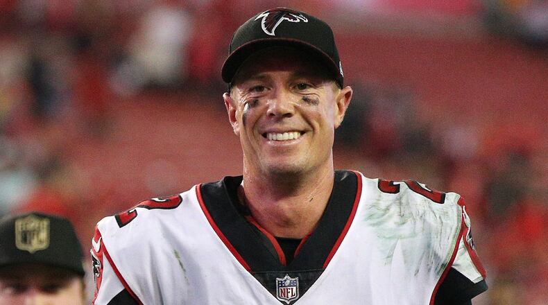 December 18, 2017 Tampa: Falcons quarterback Matt Ryan is smiling while jogging off the field with a 24-21 victory over the Buccaneers in a NFL football game on Monday, December 18, 2017, in Tampa.  Curtis Compton/ccompton@ajc.com