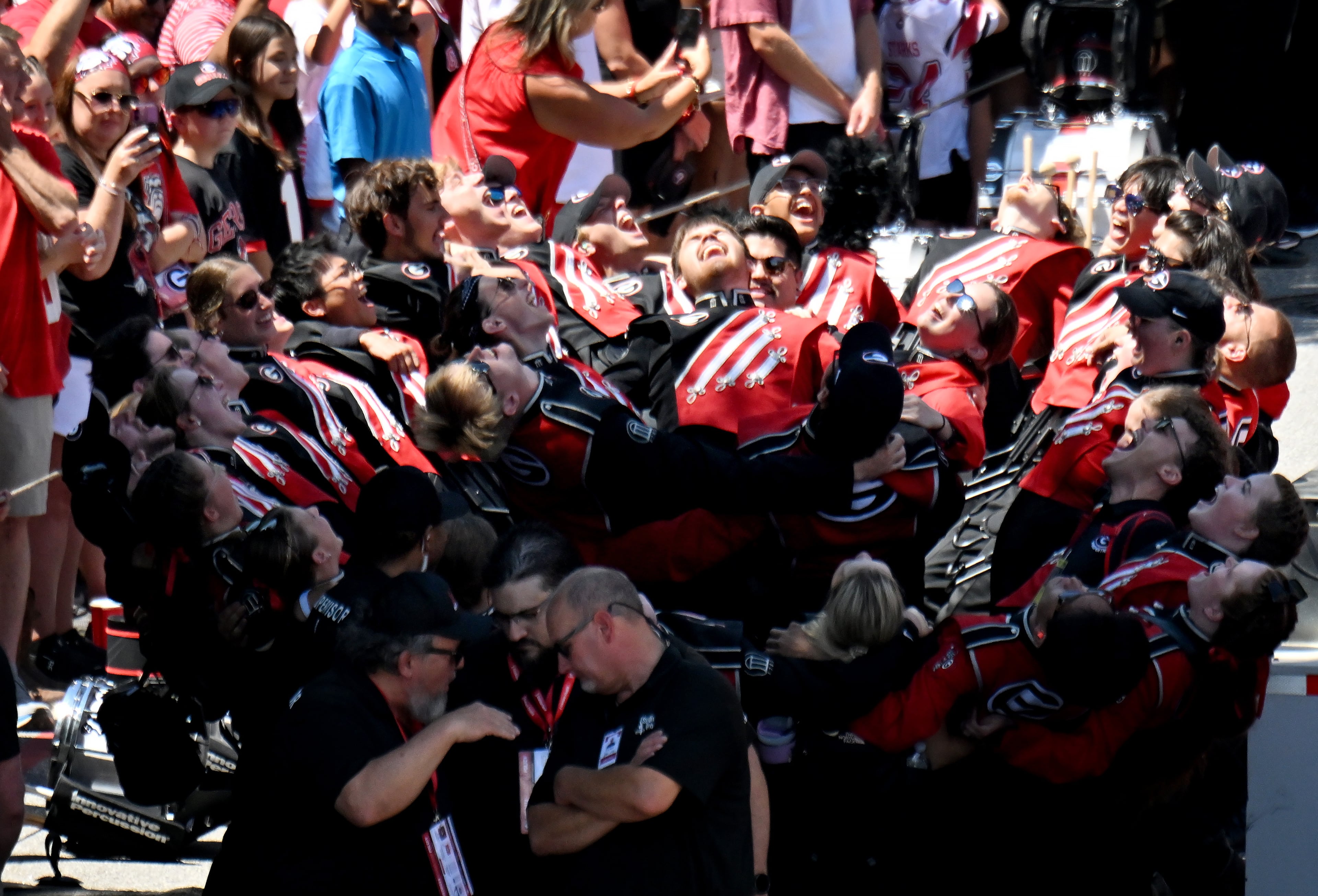 Georgia fans cheer before players and staff arrive during Dawgs Walk at Sanford Stadium, Saturday, August 30, 2025, in Athens. (Hyosub Shin / AJC)