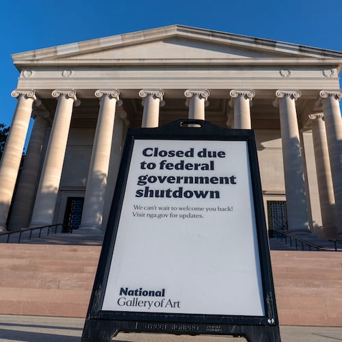 FILE - A sign that reads "Closed due to federal government shutdown," is seen outside of the National Gallery of Art in Washington, Oct. 6, 2025. (AP Photo/Jose Luis Magana, File)