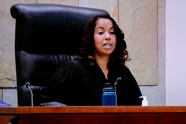 This video image provided by WOOD-TV shows Judge Christina Mims sitting in her courtroom at the Kent County Courthouse in Grand Rapids, Mich. on the first day of Christopher Schurr's trial on Monday, April 28, 2025. (WOOD-TV via AP, Pool)