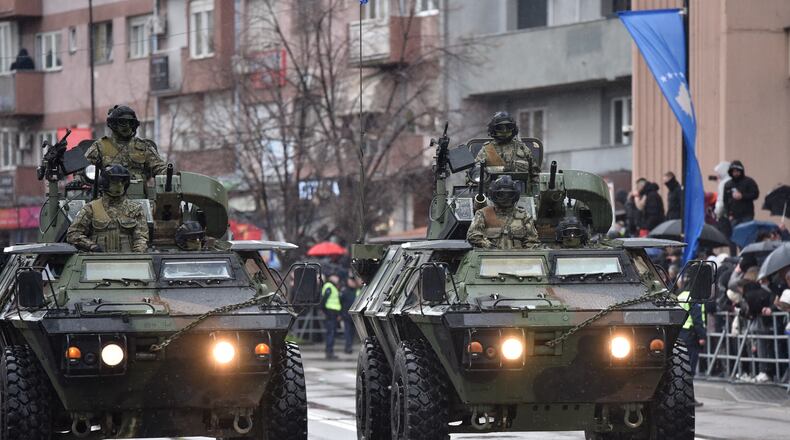 FILE -Kosovo Security Forces parade during celebrations to mark the 18th anniversary of independence, in Pristina, Kosovo, Feb. 17, 2026. (AP Photo/Laura Hasani, File)