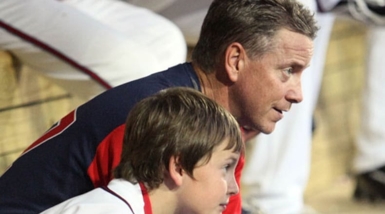 Former Braves pitcher Tom Glavine seen with son Peyton Glavine, when Peyton as 10. All grown up now, he's been signed to the Braves' minor-league team. (Jason Getz/AJC 2009)