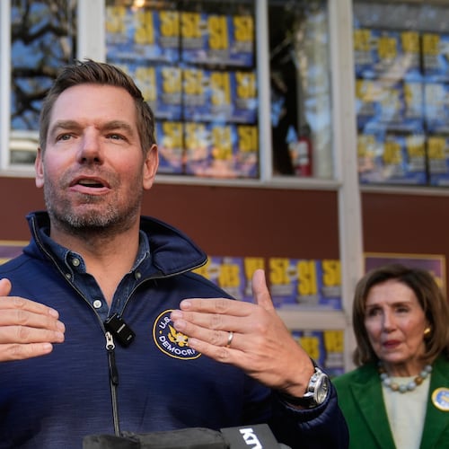 FILE - Rep. Eric Swalwell, D-Calif., speaks to reporters after a campaign event on Proposition 50 in San Francisco, on Nov. 3, 2025. (AP Photo/Jeff Chiu, File)