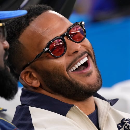 FILE - Former Los Angeles Rams player Aaron Donald looks on before an NFL football game between the Los Angeles Rams and the Tampa Bay Buccaneers, Nov. 23, 2025, in Inglewood, Calif. (AP Photo/Mark J. Terrill, File)
