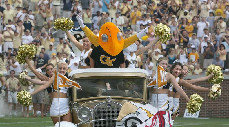 Georgia Tech's newly restored Ramblin Wreck carries Buzz and the cheerleaders on the filed during the first home game of the 2007 football season at Grant Field. The wreck had to be repaired after a crash.