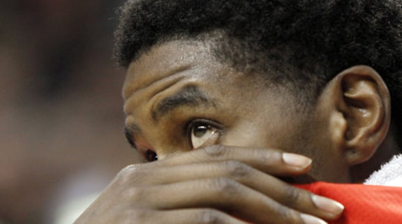 Atlanta Hawks forward Marvin Williams watches from the bench during the final minute of their NBA basketball game against the Portland Trail Blazers in Portland, Ore., Saturday, Feb. 18, 2012. Portland won 97-77.