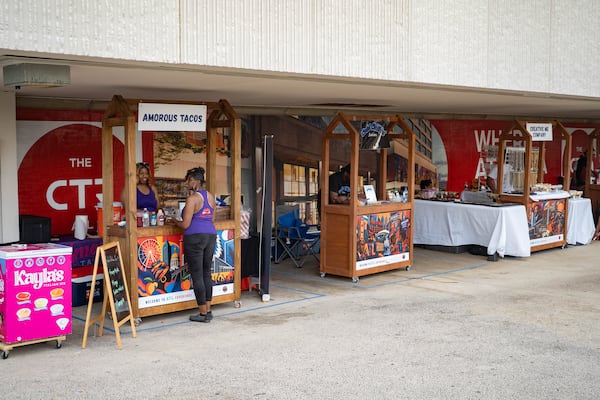 Multiple vendor booths are set up outside The Center in downtown Atlanta on June 24, 2026. (Ben Hendren for the AJC)