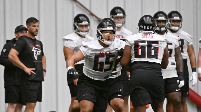 Falcons guard Matthew Bergeron (65) and Atlanta Falcons offensive tackle Bryson Speas (66) participate in a drill during rookie minicamp at Atlanta Falcons Training Facility, Friday, May 12, 2023, in Flowery Branch. (Hyosub Shin / Hyosub.Shin@ajc.com)