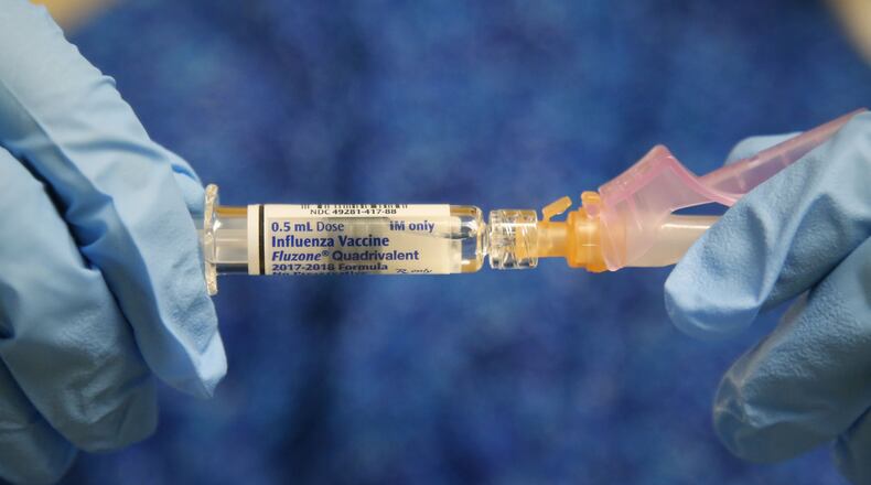 This year’s flu vaccine will not be as effective as in other years because the H3N2 virus is better at shifting to avoid it. But health officials still strongly recommend vaccination for those over 6 months old because it still can protect some patients from getting sick and others from getting sicker than they otherwise would. Savannah pediatrician Ben Spitalnick said the sickest kids he’s seeing, who sometimes must be hospitalized, are generally the ones who weren’t vaccinated. (PHOTO by TY GREENLEES / Dayton Daily News)