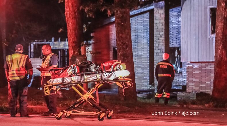 DeKalb County Fire Rescue responded to a deadly house fire on Convington Highway early Thursday.