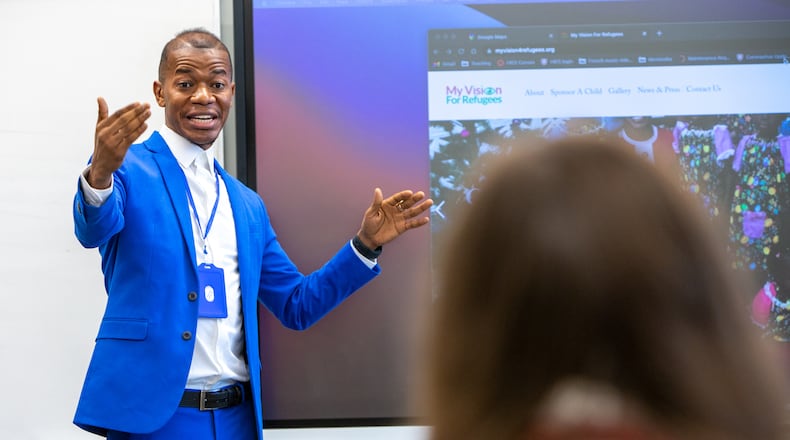 Samuel Johnson, a 2009 Alum, speaks to a French IV class at Holy Innocents' Episcopal School in Sandy Springs. After graduating from Mercer University, he founded an orphanage in West Africa. PHIL SKINNER FOR THE ATLANTA JOURNAL-CONSTITUTION.