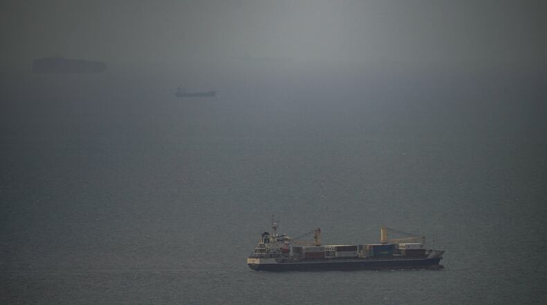 A cargo ship sails in the Persian Gulf toward the Strait of Hormuz, Wednesday, April 22, 2026. (AP Photo)