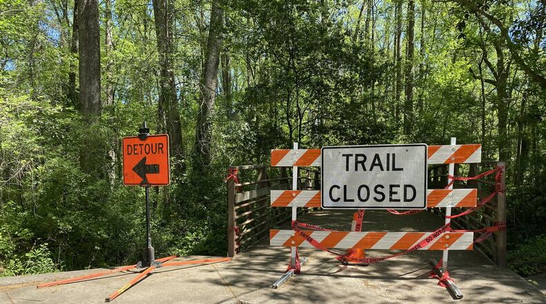 A popular trail in Decatur’s Oakhurst neighborhood has been closed while DeKalb County crews work on the Green Street Sewer Replacement Project. TYLER ESTEP / TYLER.ESTEP@AJC.COM