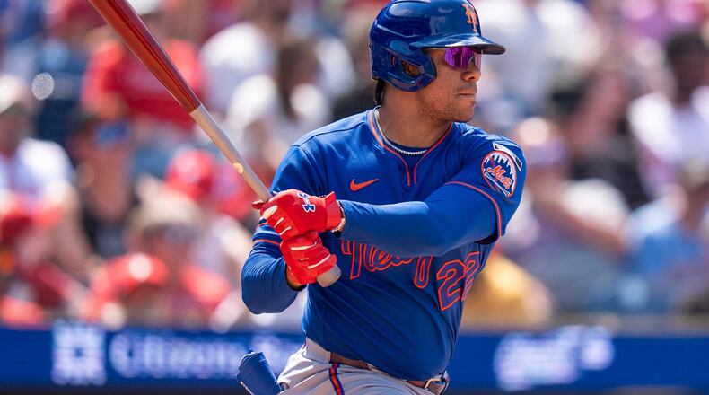 New York Mets' Juan Soto hits an RBI single during the sixth inning of a baseball game against the Philadelphia Phillies, Sunday, July 19, 2026, in Philadelphia. (AP Photo/Chris Szagola)