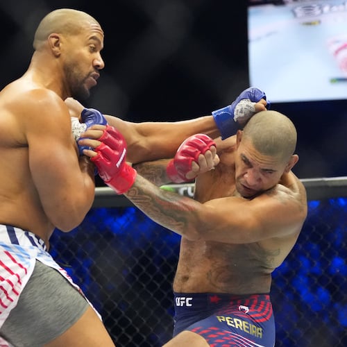Alex Pereira, right, fights Ciryl Gane during their interim heavyweight title bout at UFC Freedom 250 on the South Lawn of the White House, Monday, June 15, 2026, in Washington. (AP Photo/Alex Brandon)