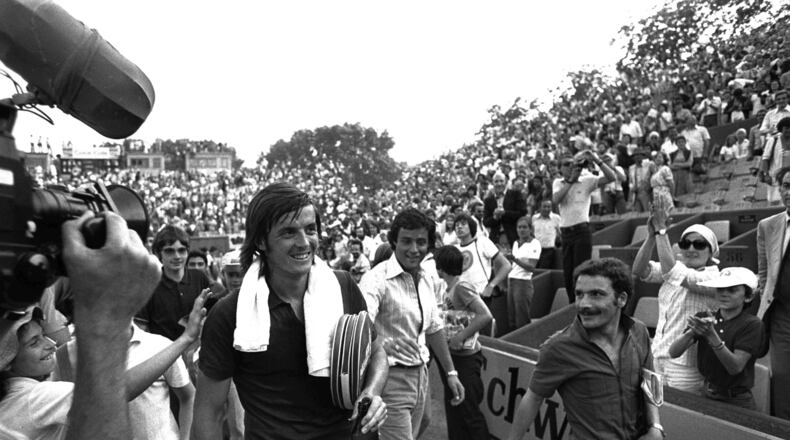 FILE - Adriano Panatta smiles after the quarter final match of the French Open Tennis Tournament in Paris on Sept. 6, 1976. (AP Photo/Michel Lipchitz)