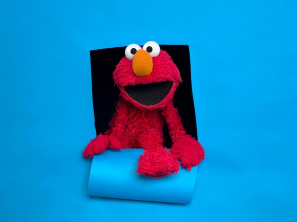 FILE - Elmo of the film "Being Elmo" poses for a portrait in the Fender Music Lodge during the 2011 Sundance Film Festival in Park City, Utah on Jan. 24, 2011. (AP Photo/Victoria Will, File)