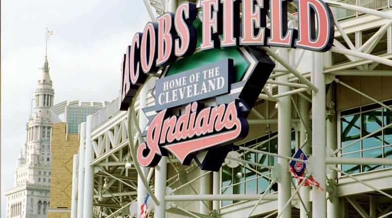 The sign welcoming baseball fans to Jacobs Field is framed by a few of Cleveland's skyscrapers as the Indians face the Braves in Game 3 of the 1995 World Series at the new ballpark. (David Tulis/AJC)