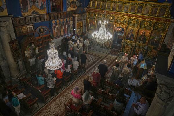 Palestinian Christians attend a Palm Sunday mass at the Greek Orthodox Church of Saint Porphyrius in Gaza City, Sunday, April 13, 2025. (AP Photo/Jehad Alshrafi)