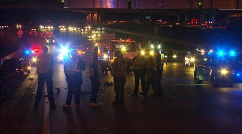 A driver was struck by a car and killed on I-75 near Cobb County after getting out of his SUV on the interstate. (Credit: Channel 2 Action News)