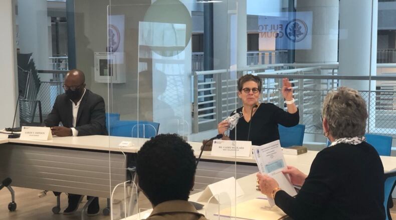 Fulton County's election board voted 3-2 Thursday to establish rules about how to question the eligibility of voters.