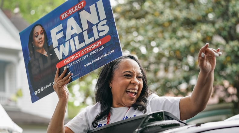 Fulton County District Attorney Fani Willis rides in a car while participating in the Inman Park Parade on Saturday, April 27, 2024, in Atlanta. (Elijah Nouvelage for The Atlanta Journal-Constitution)