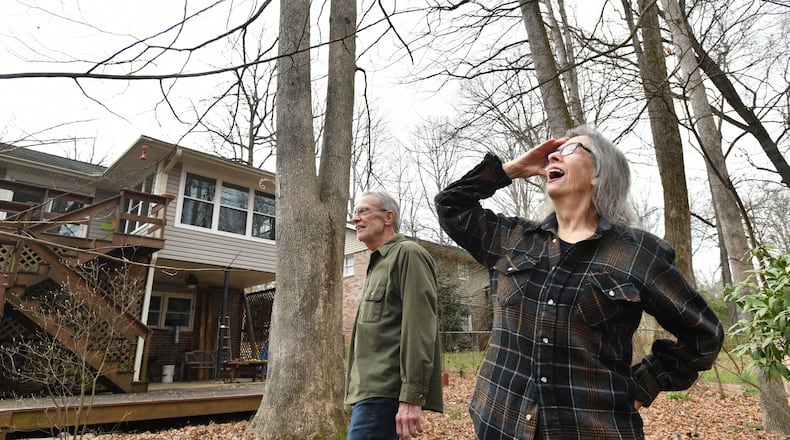 Rick Krause and his wife, Sandy, react as they watch a bird in the backyard of their home in Lilburn on Tuesday, March 10, 2020. Sandy and Rick began to notice problems with her memory several years ago. She was eventually diagnosed with Alzheimer’s disease, and he is her caregiver. HYOSUB SHIN / HYOSUB.SHIN@AJC.COM