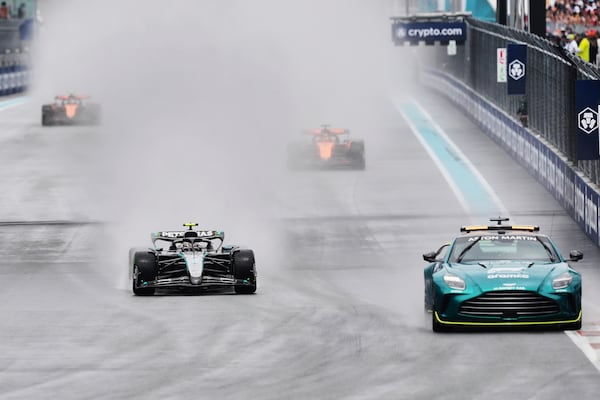 Drivers participate in a safety car lap before the Sprint race at the Formula One Miami Grand Prix auto race, Saturday, May 3, 2025, in Miami Gardens, Fla. (AP Photo/Rebecca Blackwell)