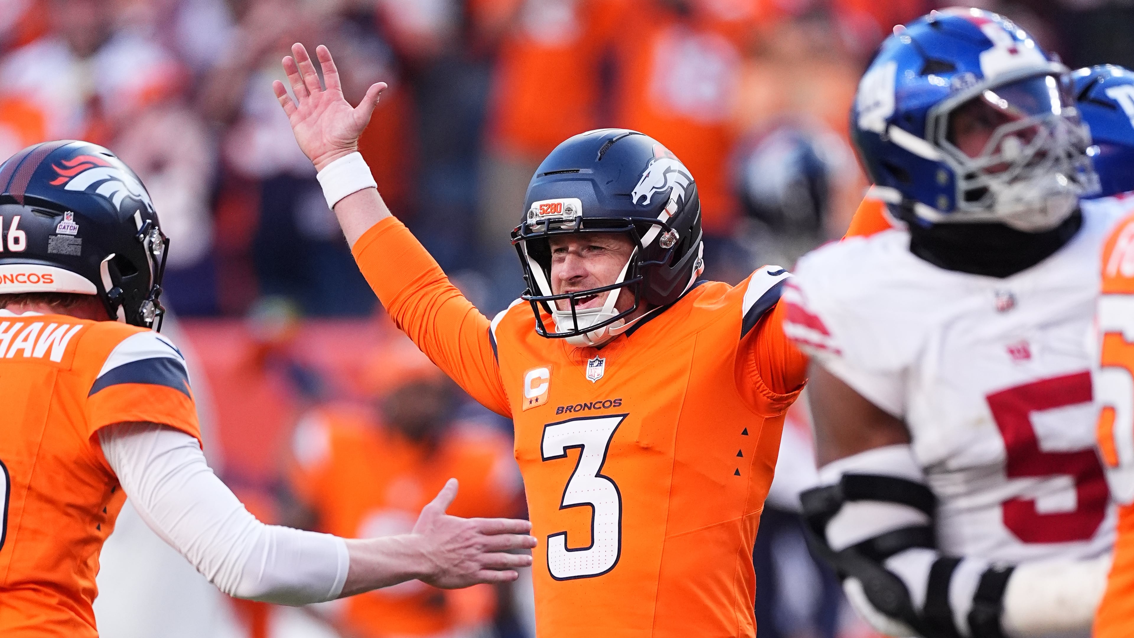 Denver Broncos kicker Wil Lutz (3) celebrates after kicking the game winning field goal during the second half of an NFL football game against the New York Giants in Denver, Sunday, Oct. 19, 2025. (AP Photo/David Zalubowski)