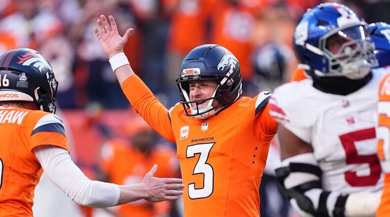 Denver Broncos kicker Wil Lutz (3) celebrates after kicking the game winning field goal during the second half of an NFL football game against the New York Giants in Denver, Sunday, Oct. 19, 2025. (AP Photo/David Zalubowski)