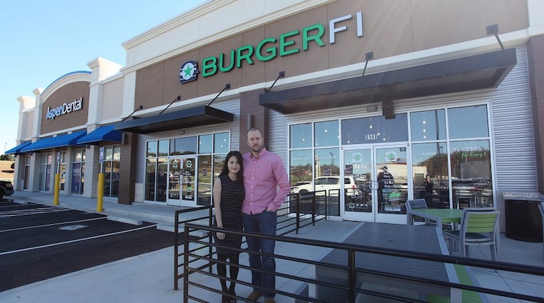 Claire Shoener (left) and Elliot Shoener will open their BurgerFi franchise in Peachtree Corners on March 12.