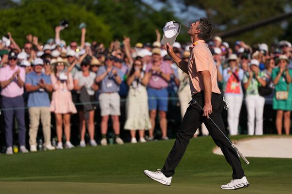 Justin Rose celebrates after a birdie on the 18th hole during the final round at the Masters golf tournament, Sunday, April 13, 2025, in Augusta, Ga. (AP Photo/Matt Slocum)