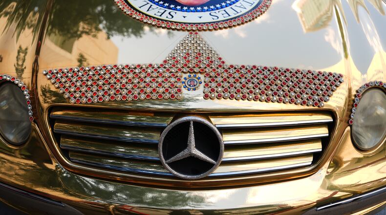 A Mercedes decorated with images of President Donald Trump is seen outside before the Republican convention Tuesday, Sept. 8, 2026, in Dallas. (AP Photo/Julia Demaree Nikhinson)
